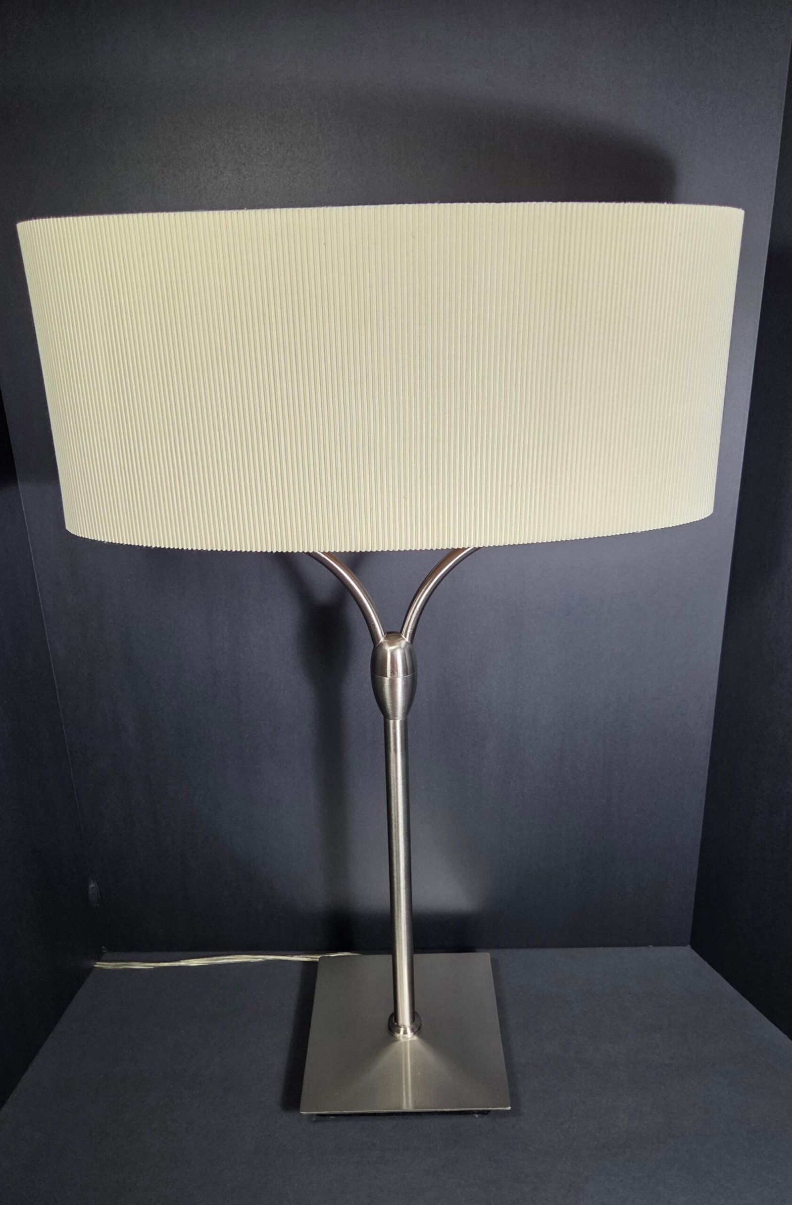 Elegant contemporary table lamp featuring a sleek brushed-metal finish - Image 6