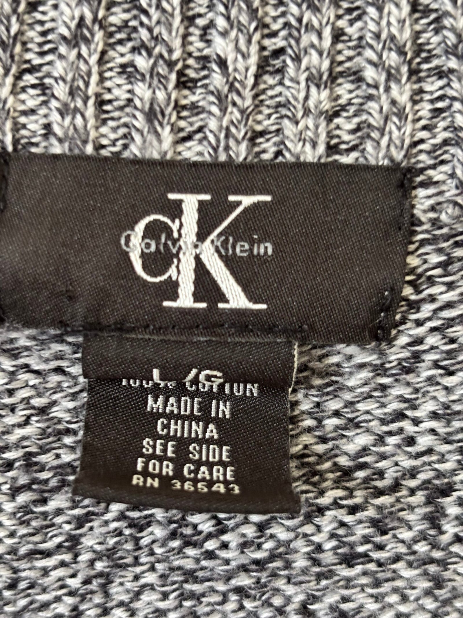 Calvin Klein men’s quarter-zip sweater in a versatile heather gray knit. - Image 2